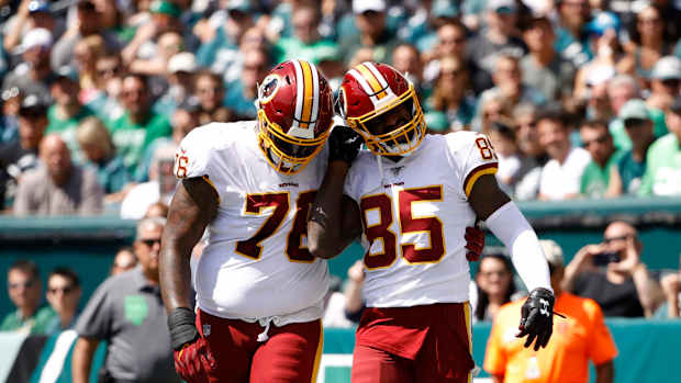 Morgan Moses, Vernon Davis (AP Photo/Matt Rourke)