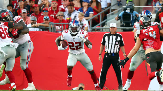 Sep 22, 2019; Tampa, FL, USA; New York Giants running back Wayne Gallman (22) runs with the ball against the Tampa Bay Buccaneers during the second half at Raymond James Stadium.