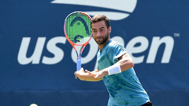 noah-rubin-behind-racquet.jpg