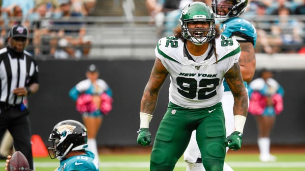 Oct 27, 2019; Jacksonville, FL, USA; New York Jets defensive end Leonard Williams (92) reacts after sacking Jacksonville Jaguars quarterback Gardner Minshew (15) during the third quarter at TIAA Bank Field.