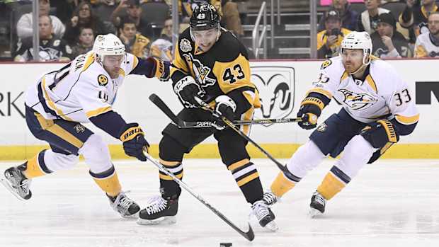 sheary-ekholm-wilson-playoffs-nhl-1300.jpg