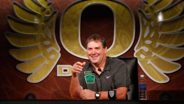 With a friend nearby and a big job ahead, Brady Hoke is ready to fix an Oregon defense in serious need of repair