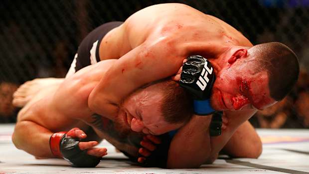 ufc-196-nate-diaz-beats-conor-mcgregor-miesha-tate-defeats-holly-holm.jpg