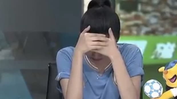 Chinese broadcaster crying