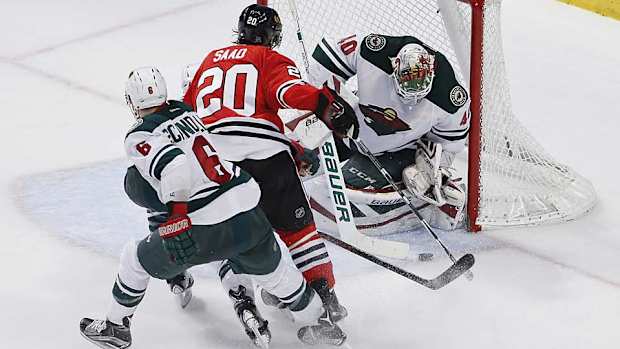 Devan-Dubnyk-vs-Blackhawks-AP-Kamil-Krzaczynski.jpg