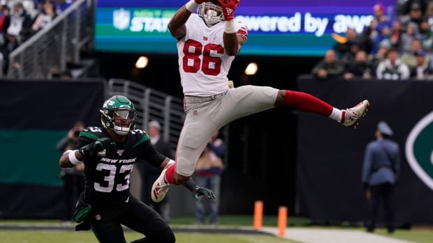 Nov 10, 2019; East Rutherford, NJ, USA; New York Giants wide receiver Darius Slayton (86) hauls in a reception in the 3rd quarter against the Jets as New York Jets strong safety Jamal Adams (33) defends at MetLife Stadium.