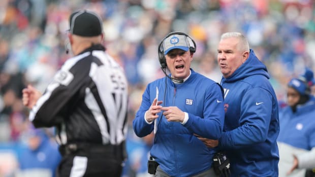 Dec 15, 2019; East Rutherford, NJ, USA; New York Giants head coach Pat Shurmur signals for time out to side judge Alex Kemp (55) during the first half against the Miami Dolphins at MetLife Stadium.