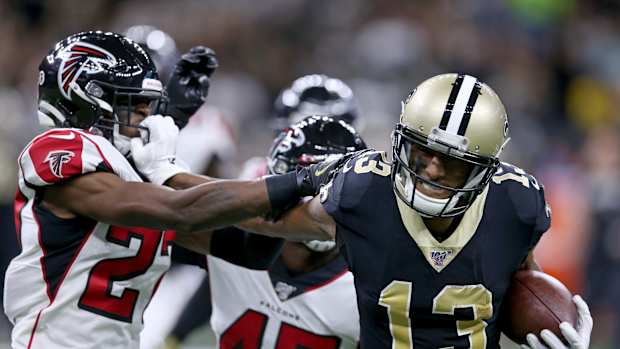 Michael Thomas stiff arms defender