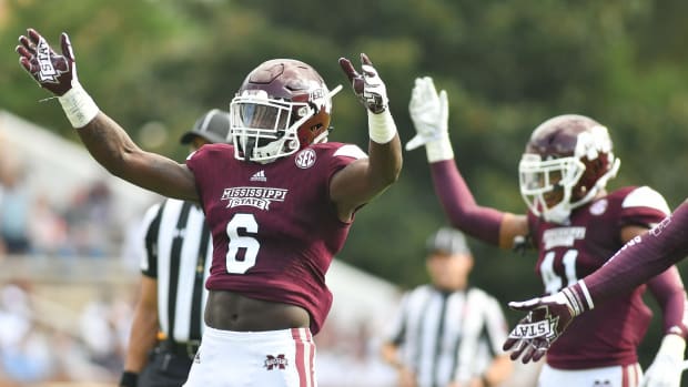 Sep 2, 2017; Starkville, MS, USA; Mississippi State Bulldogs linebacker Willie Gay Jr (6) pumps up the crowd during the game against the Charleston Southern Buccaneers. at Davis Wade Stadium. Mandatory Credit: Matt Bush-USA TODAY Sports