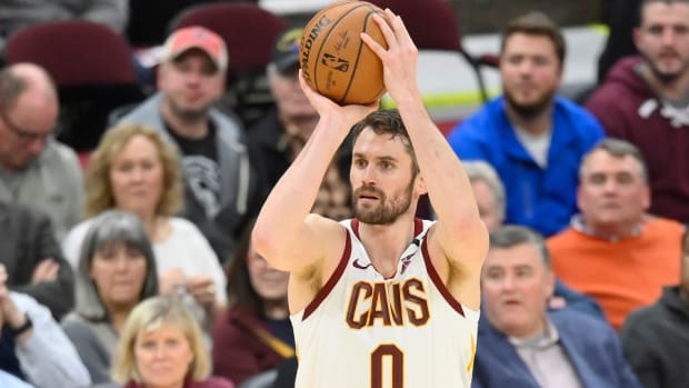 Cleveland Cavaliers forward Kevin Love shoots a a 3-pointer against the Toronto Raptors at Rocket Mortgage FieldHouse.