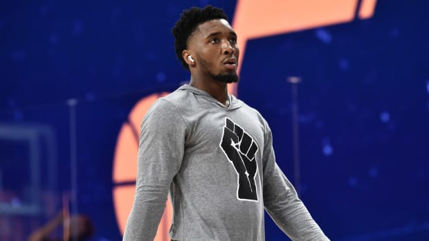 Donovan Mitchell of the Utah Jazz warms up before a game