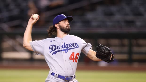 Jul 31, 2020; Phoenix, Arizona, USA; Los Angeles Dodgers pitcher Tony Gonsolin throws in the first inning against the Arizona Diamondbacks at Chase Field. Mandatory Credit: Mark J. Rebilas-USA TODAY Sports