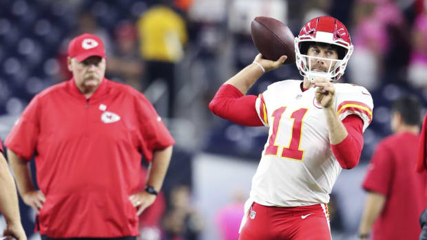 Oct 8, 2017; Houston, TX, USA; Kansas City Chiefs quarterback Alex Smith (11) throws in front of head coach Andy Reid before the game against the Houston Texans at NRG Stadium. Mandatory Credit: Kevin Jairaj-USA TODAY Sports