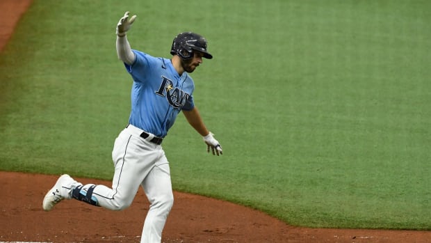 Aug 9, 2020; St. Petersburg, Florida, USA; Tampa Bay Rays second baseman Brandon Lowe (8) reacts after hitting a home run to tie the game 3-3 during the seventh inning against the New York Yankees at Tropicana Field. Mandatory Credit: Douglas DeFelice-USA TODAY Sports