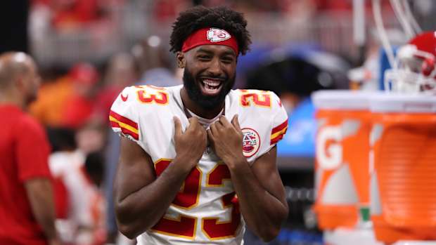 NFL DB Kendall Fuller laughs on the sideline