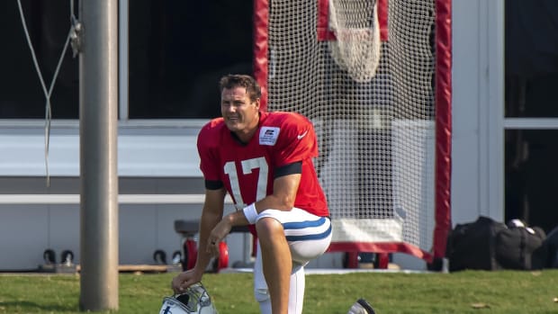 Quarterback Philip Rivers takes a knee during a preseason practice. The 38-year-old passer is entering his 17th NFL season, and first with the Indianapolis Colts.