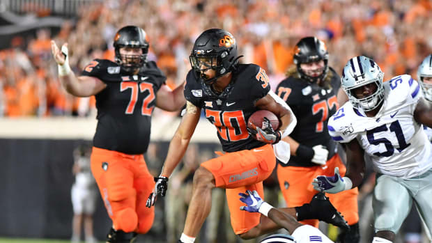 The offensive line looks to continue carving out big holes for Chuba Hubbard and Co.