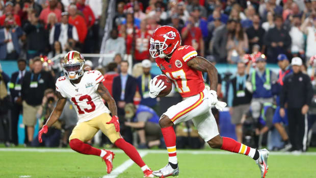 Feb 2, 2020; Miami Gardens, Florida, USA; Kansas City Chiefs wide receiver Mecole Hardman (17) runs past San Francisco 49ers wide receiver Richie James (13) in the first quarter in Super Bowl LIV at Hard Rock Stadium. Mandatory Credit: Mark J. Rebilas-USA TODAY Sports