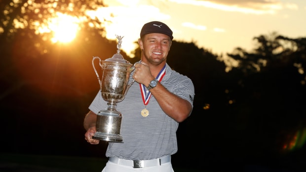 Bryson DeChambeau poses and celebrates with the trophy after winning the U.S. Open golf tournament at Winged Foot Golf Club - West.