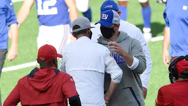 New York Giants head coach Joe Judge and San Francisco 49ers head coach Kyle Shanahan hug after the game. The New York Giants lose to the San Francisco 49ers, 36-9, in an NFL game at MetLife Stadium on Sunday, Sept. 27, 2020, in East Rutherford. Giants 49ers