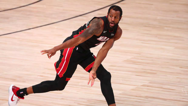 Miami Heat guard Andre Iguodala reacts after making a three pointer