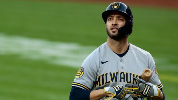Milwaukee Brewers left fielder Ryan Braun (8) walks back to the dugout after striking out in the first inning of the MLB National League game between the Cincinnati Reds and the Milwaukee Brewers at Great American Ball Park in downtown Cincinnati on Tuesday, Sept. 22, 2020. The Reds gave up an early lead to lose 3-2. Milwaukee Brewers At Cincinnati Reds