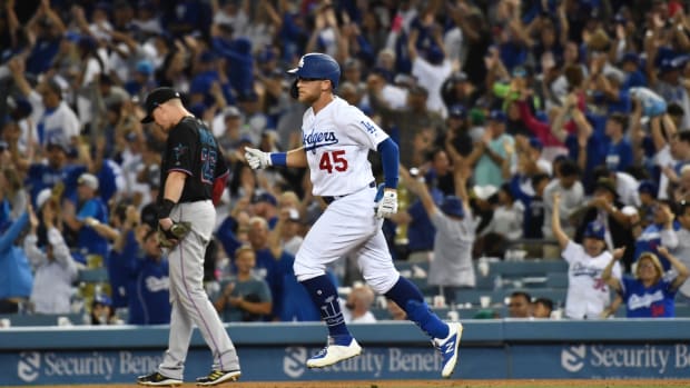 Jul 20, 2019; Los Angeles, CA, USA; Los Angeles Dodgers first baseman Matt Beaty (45) reacts after hitting a three run home run in the 8th inning against the Miami Marlins at Dodger Stadium. Mandatory Credit: Robert Hanashiro-USA TODAY Sports