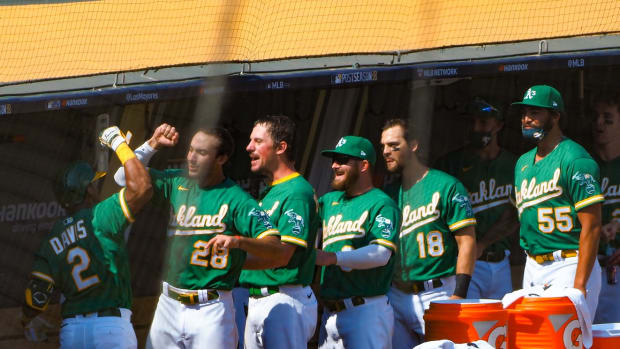 A's dugout fired up after Khris Davis' homer in Game 2 Wednesday.