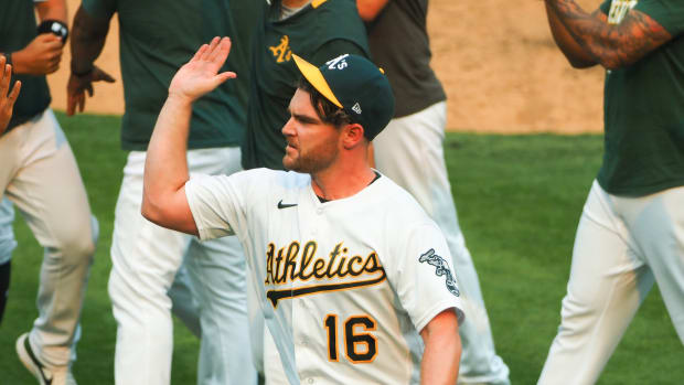 Liam Hendriks celebrates A's wild card-clinching win