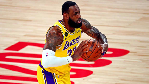 Los Angeles Lakers forward LeBron James passes the ball in the NBA Finals