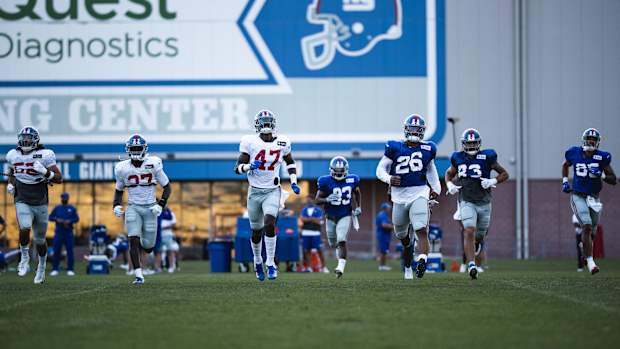 New York Giants run through drills.