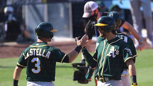 Chad Pinder greeted by Tommy La Stella after game-tying homer 10-07-2020