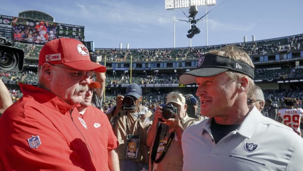 Sep 15, 2019; Oakland, CA, USA; Kansas City Chiefs head coach Andy Reid and Oakland Raiders head coach Jon Gruden meet after the game at the Oakland Coliseum. Mandatory Credit: Stan Szeto-USA TODAY Sports