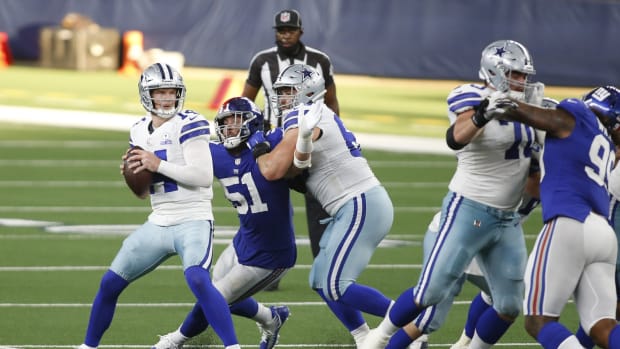 Oct 11, 2020; Arlington, Texas, USA; Dallas Cowboys quarterback Andy Dalton (14) looks to throw from the pocket in the fourth quarter against the New York Giants at AT&T Stadium.