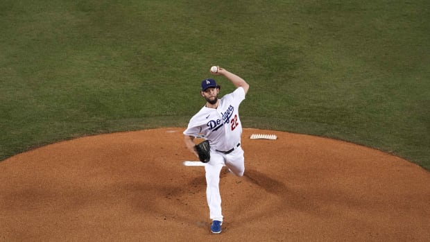 Oct 1, 2020; Los Angeles, California, USA; Los Angeles Dodgers starting pitcher Clayton Kershaw (22) delivers a pitch in the first inning against the Milwaukee Brewers during Game 2 of the National League Wild Card playoffs at Dodger Stadium. Mandatory Credit: Kirby Lee-USA TODAY Sports