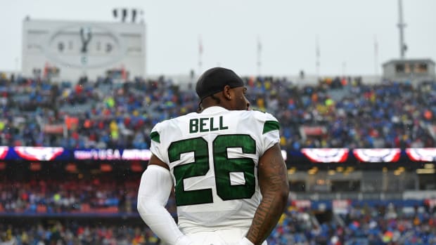 Dec 29, 2019; Orchard Park, New York, USA; New York Jets running back Le'Veon Bell (26) looks on during the National Anthem prior to the game against the Buffalo Bills at New Era Field. Mandatory Credit: Rich Barnes-USA TODAY Sports