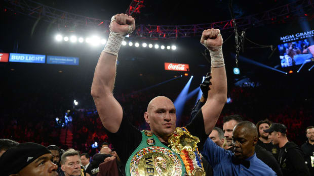 Tyson Fury celebrates his win over Deontay Wilder