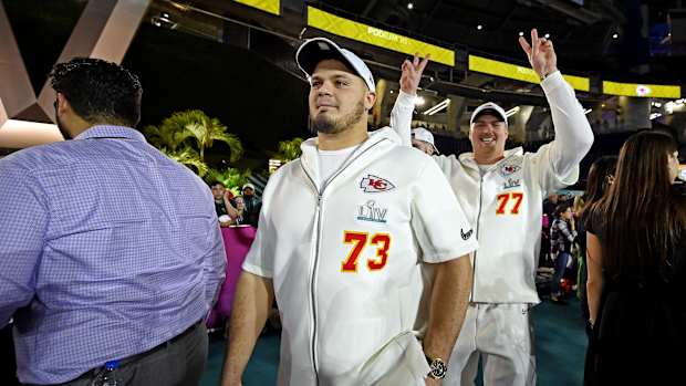 Jan 27, 2020; Miami, FL, USA; Kansas City Chiefs offensive guard Nick Allegretti (73) and Kansas City Chiefs offensive guard Andrew Wylie (77) during Super Bowl LIV Opening Night at Marlins Park. Mandatory Credit: Douglas Defelice-USA TODAY Sports