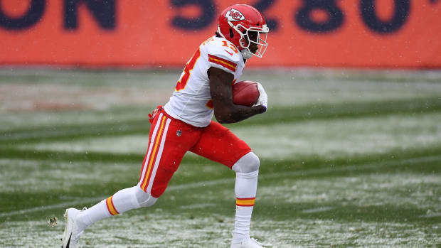 Oct 25, 2020; Denver, Colorado, USA; Kansas City Chiefs wide receiver Byron Pringle (13) returns a punt for a touchdown in the first half against the Denver Broncos at Empower Field at Mile High. Mandatory Credit: Ron Chenoy-USA TODAY Sports