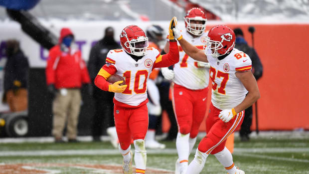 Oct 25, 2020; Denver, Colorado, USA; Kansas City Chiefs wide receiver Tyreek Hill (10) celebrates his score with tight end Travis Kelce (87) in the second half at Empower Field at Mile High. Mandatory Credit: Ron Chenoy-USA TODAY Sports