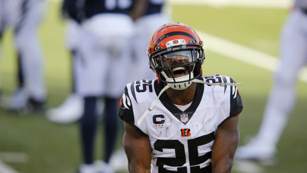 Nov 1, 2020; Cincinnati, Ohio, USA; Cincinnati Bengals running back Giovani Bernard (25) celebrates after a touchdown run against the Tennessee Titans during the second quarter at Paul Brown Stadium. Mandatory Credit: Joseph Maiorana-USA TODAY Sports