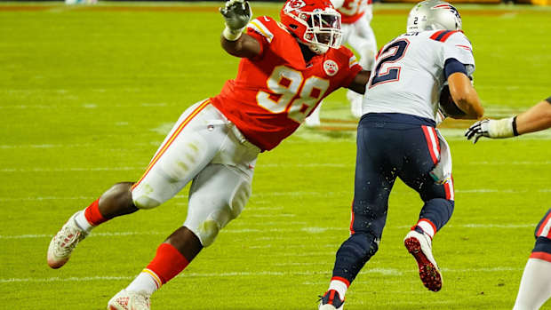 Oct 5, 2020; Kansas City, Missouri, USA; Kansas City Chiefs defensive end Tershawn Wharton (98) tackles New England Patriots quarterback Brian Hoyer (2) at Arrowhead Stadium. Mandatory Credit: Jay Biggerstaff-USA TODAY Sports