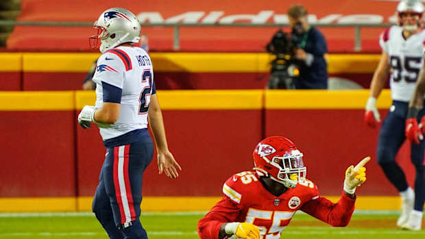 Oct 5, 2020; Kansas City, Missouri, USA; Kansas City Chiefs defensive end Frank Clark (55) celebrates after sacking New England Patriots quarterback Brian Hoyer (2) at Arrowhead Stadium. Mandatory Credit: Jay Biggerstaff-USA TODAY Sports