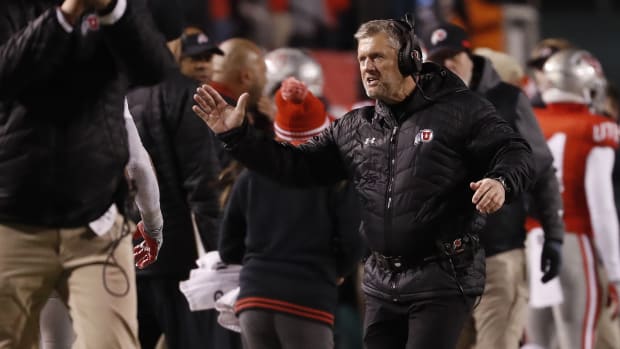 Nov 30, 2019; Salt Lake City, UT, USA; Utah Utes head coach Kyle Whittingham celebrates after a third quarter touchdown against the Colorado Buffaloes at Rice-Eccles Stadium.