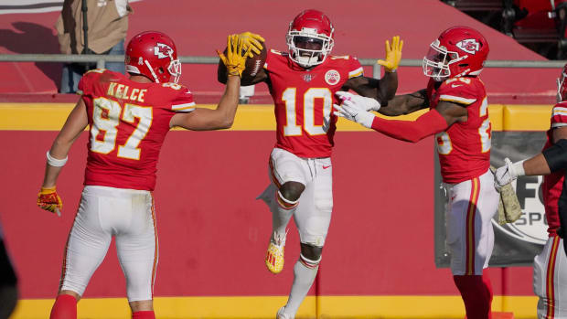 Nov 8, 2020; Kansas City, Missouri, USA; Kansas City Chiefs wide receiver Tyreek Hill (10) celebrates with tight end Travis Kelce (87) and running back Clyde Edwards-Helaire (25) after scoring against the Carolina Panthers during the second half at Arrowhead Stadium. Mandatory Credit: Denny Medley-USA TODAY Sports