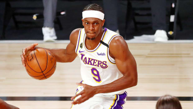 Los Angeles Lakers guard Rajon Rondo dribbles against the Miami Heat