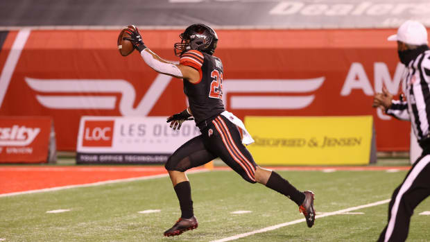 Nov 21, 2020; Salt Lake City, Utah, USA; Utah Utes linebacker Nephi Sewell (29) holds the ball up as he runs into the end zone after picking up a USC Trojans fumble during the second quarter at Rice-Eccles Stadium.