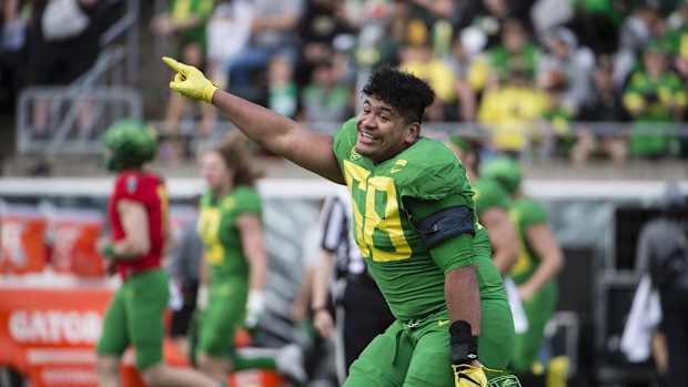 Apr 20, 2019; Eugene, OR, USA; Oregon Ducks offensive lineman Penei Sewell (58) points the scoreboard after the Oregon spring game at Autzen Stadium. Mighty Oregon beat Fighting Ducks 20-13. Mandatory Credit: Troy Wayrynen-USA TODAY Sports