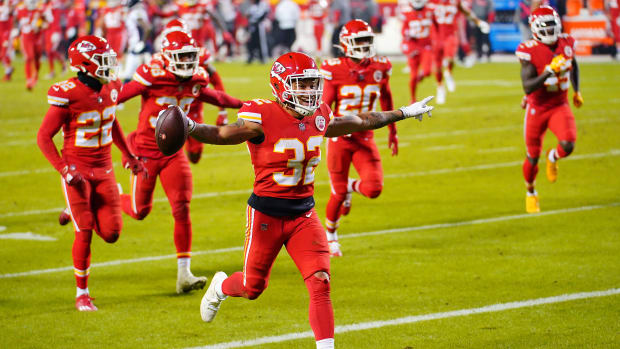 Dec 6, 2020; Kansas City, Missouri, USA; Kansas City Chiefs strong safety Tyrann Mathieu (32) celebrates with teammates after an interception during the second half against the Denver Broncos at Arrowhead Stadium. Mandatory Credit: Jay Biggerstaff-USA TODAY Sports