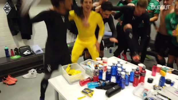 Gladbach stars celebrate qualifying for the Champions League round of 16